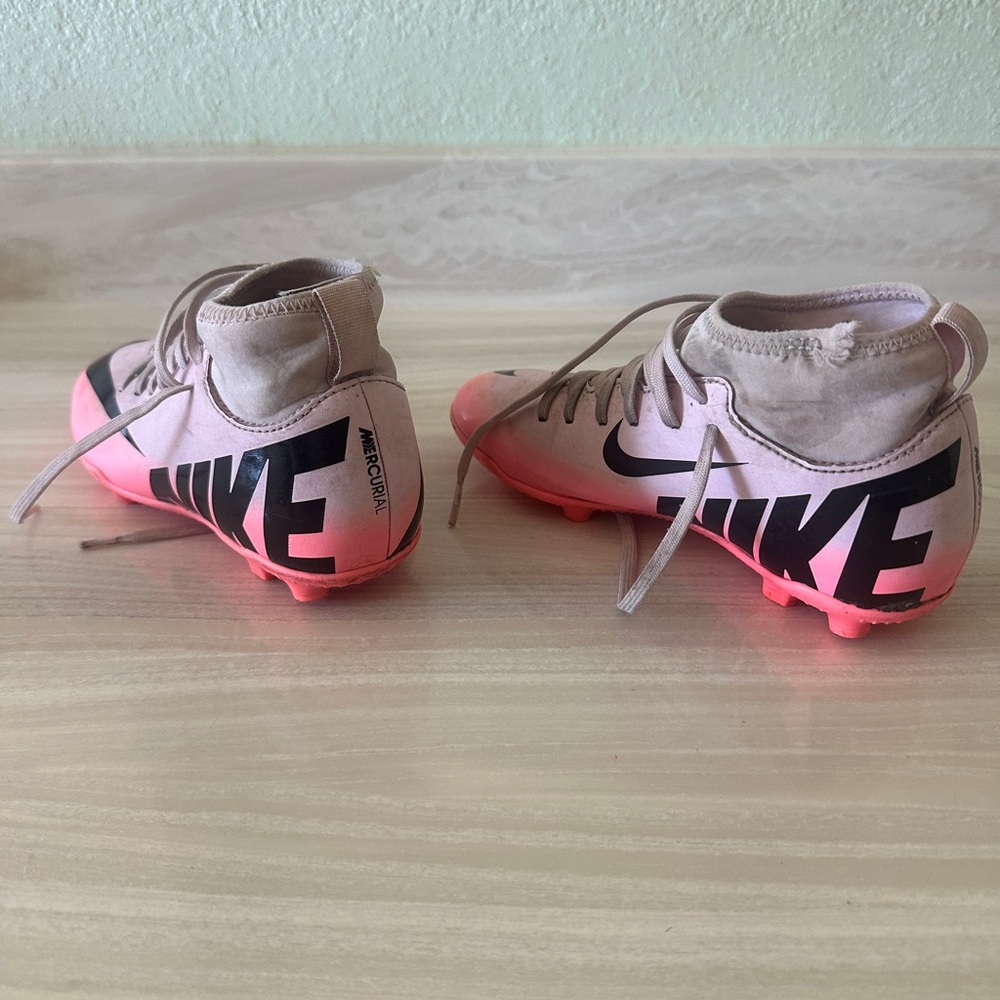 Nike Pink and Black High-Top Cleats